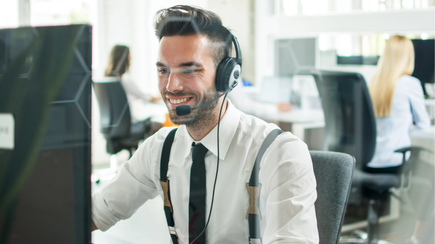 An agent speaks with clients over the phone