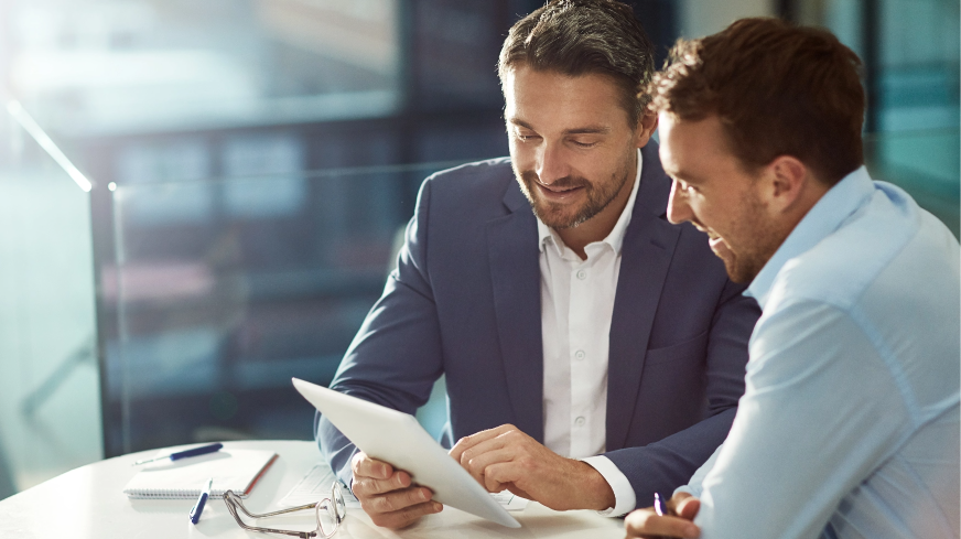 A client and an agent review a checklist on a tablet